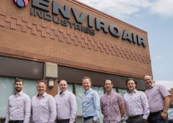 Photo of the team in front of the Enviroair office.